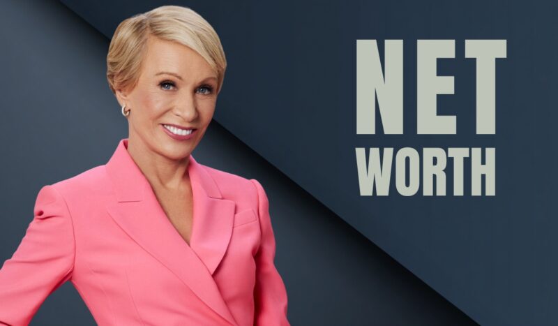 Businesswoman in a pink blazer standing beside net worth text