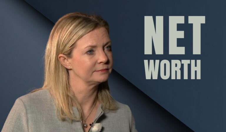 Emma Murphy in a professional interview setting with "Net Worth" text in the background