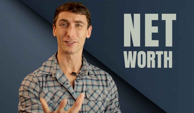 Man in a plaid shirt smiling in front of a graphic that reads "Net Worth."