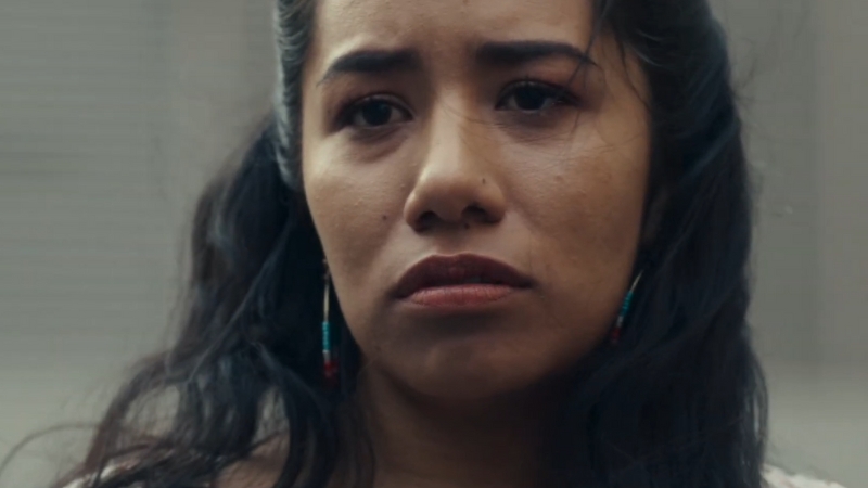 Shani Lozano looks ahead with a serious expression on her face