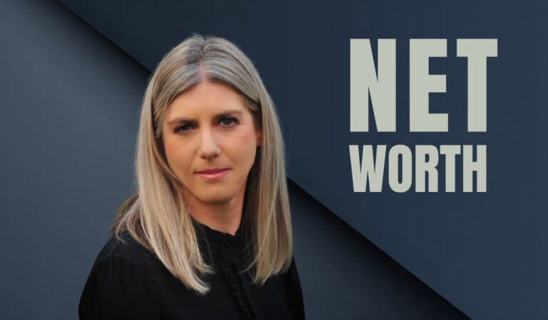 Judith Moritz posing in front of a dark background with the words "Net Worth."