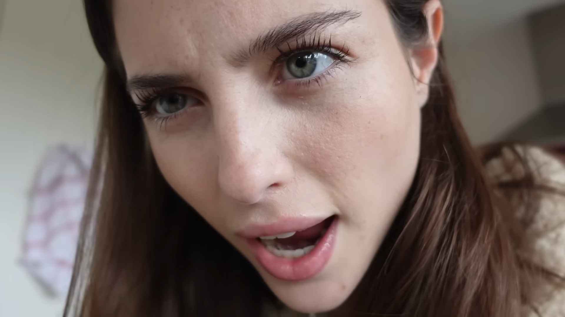Close-up of Madeline Argy speaking with an expressive look