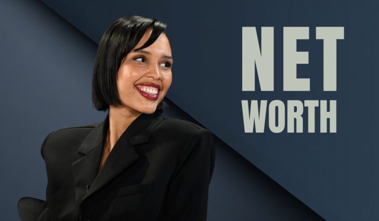 Nara Smith smiling in a black blazer with the words "Net Worth" displayed beside her