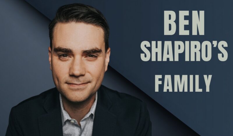 A person in a suit smiling in front of a dark blue background with text about their family