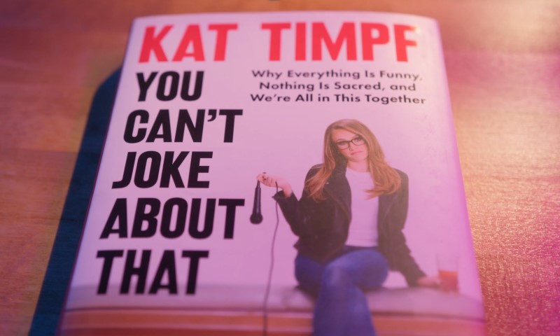 Book cover of "You Can't Joke About That" by Kat Timpf, featuring a bold title and a portrait of the author