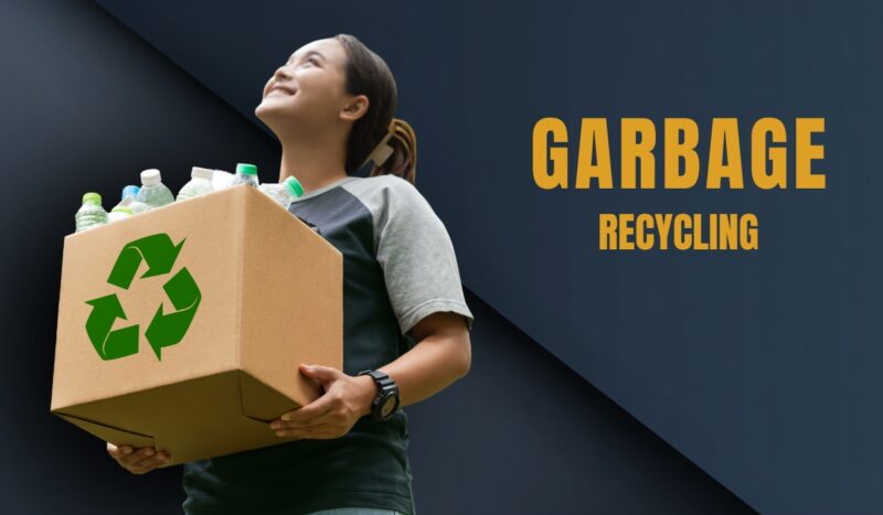 Woman holds a box of bottles with a recycle symbol to show garbage recycling
