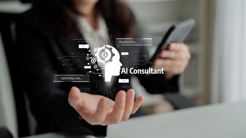 Business professional holding a phone with a digital AI consultant interface and automation icons displayed