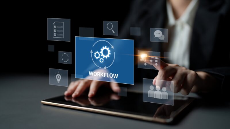 A business user manages workflow automation on a tablet
