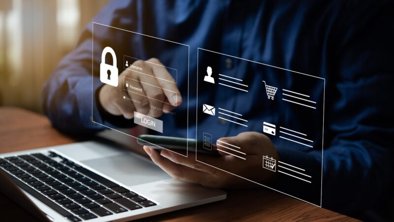 Person checks a secure e-commerce login screen on a laptop